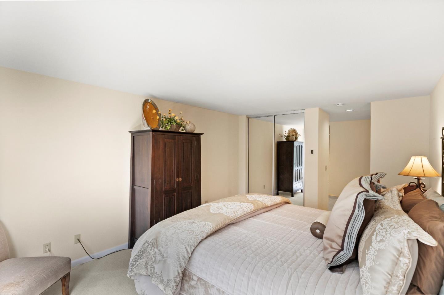 51 Shepherds Knoll Road, Unit 51 Monterey, CA 93940 - Photo 15 of 18 a bedroom with a bed and a dresser
