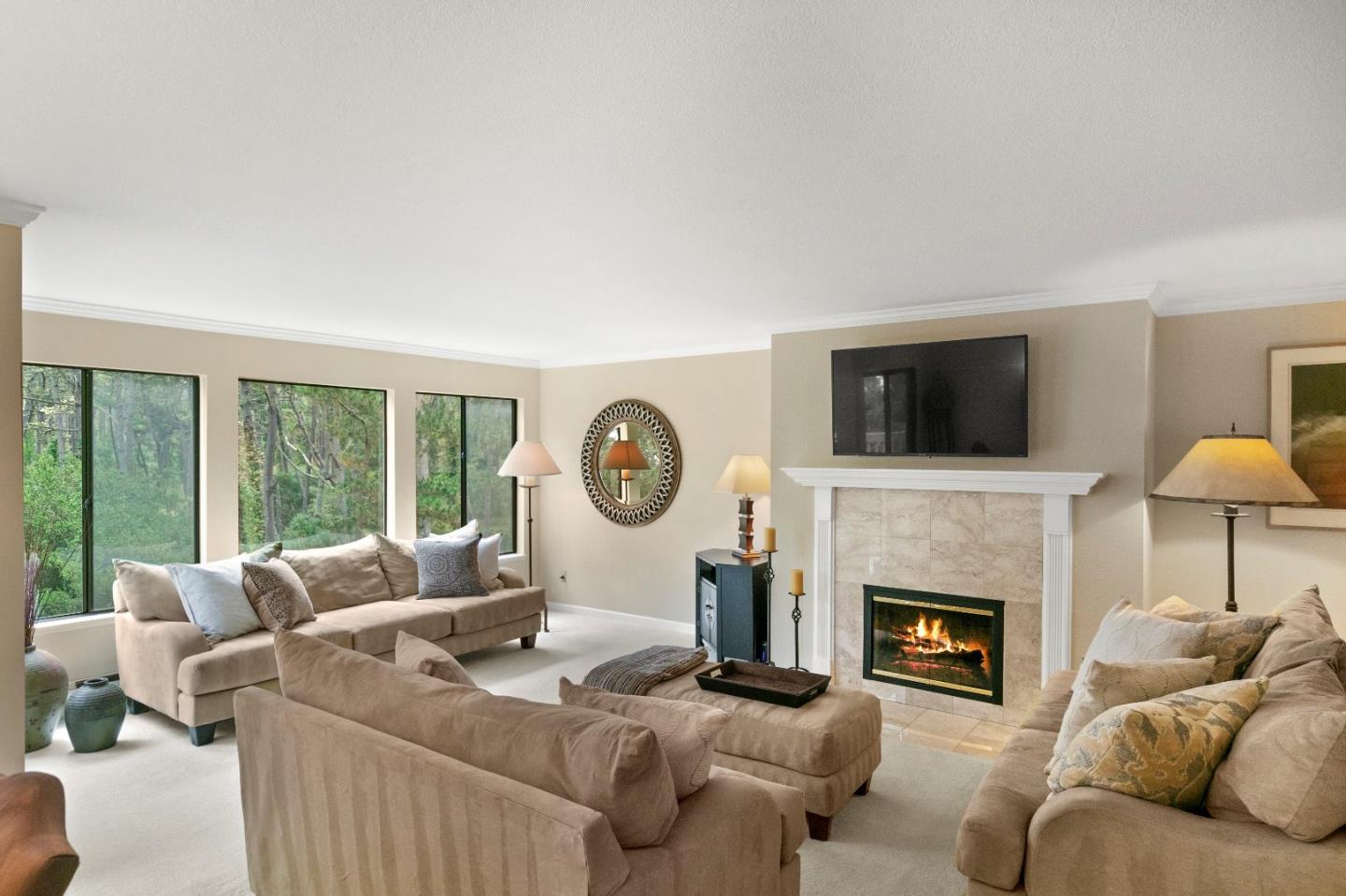 51 Shepherds Knoll Road, Unit 51 Monterey, CA 93940 - Photo 6 of 18 a living room with furniture a fireplace and a large window