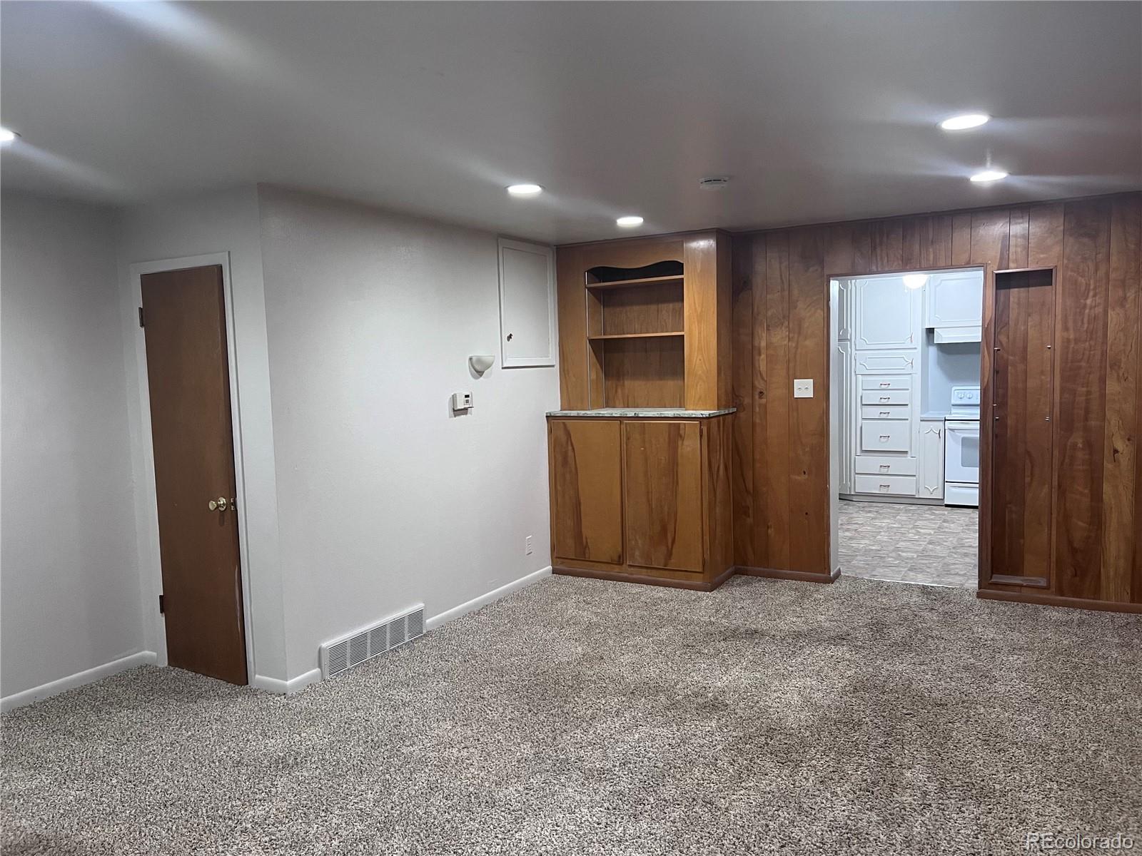 Undisclosed Address Denver, CO 80210 - Photo 21 of 31 an empty room with closet and windows