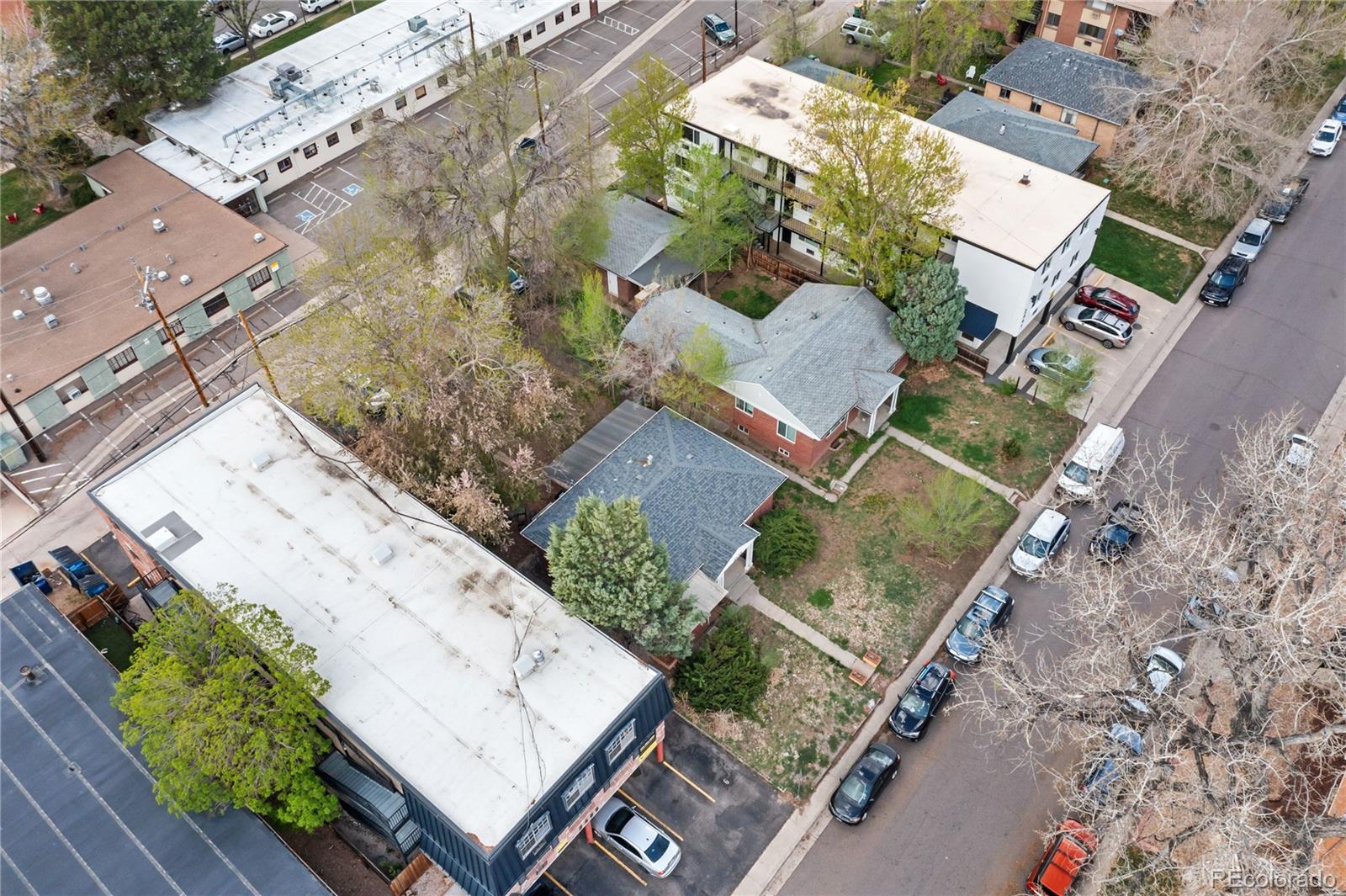 Undisclosed Address Denver, CO 80210 - Photo 22 of 31 an aerial view of a house with a yard and greenery