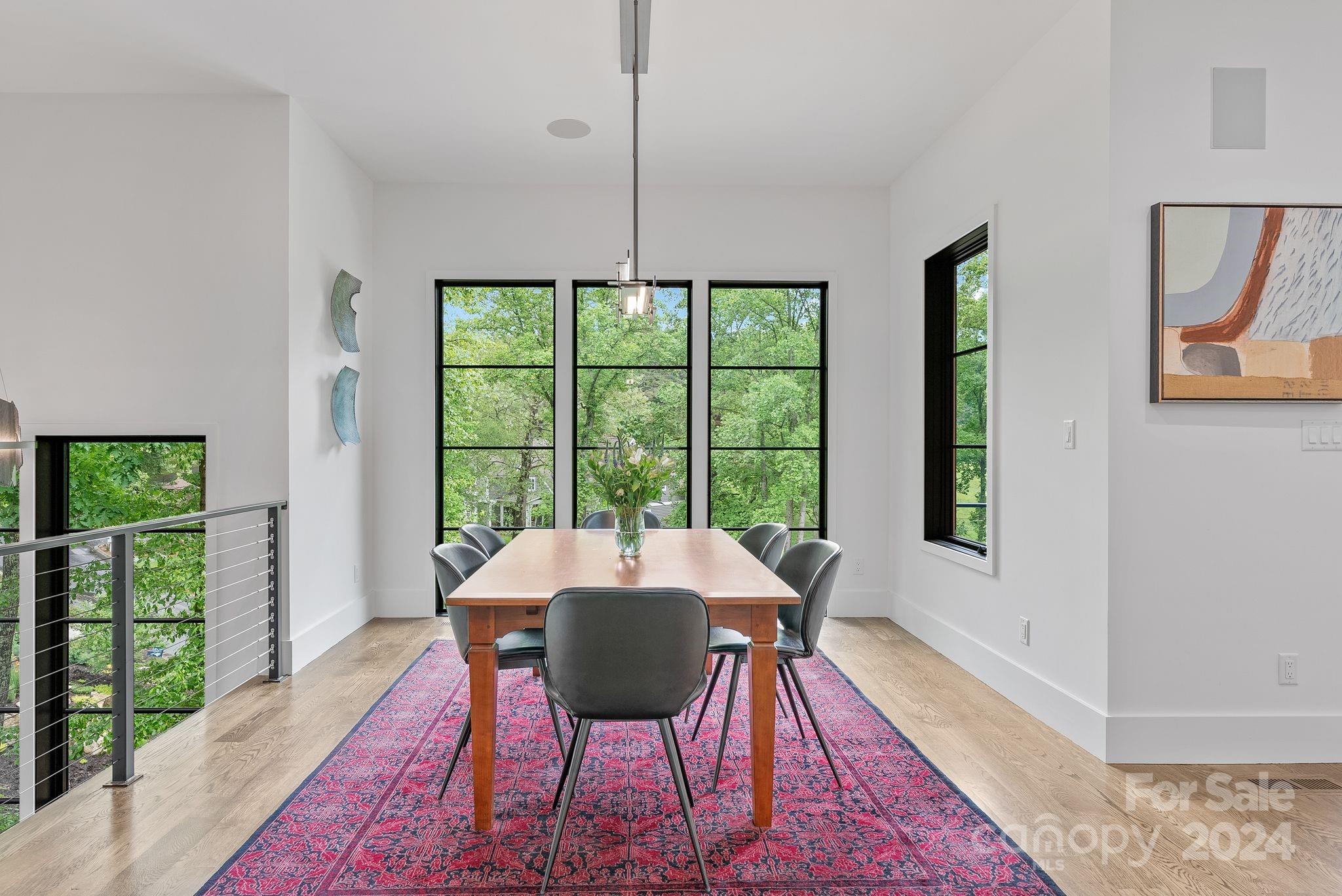 38 Brookwood Road Asheville, NC 28804 - Photo 15 of 45 a view of a dining room with furniture window and wooden floor