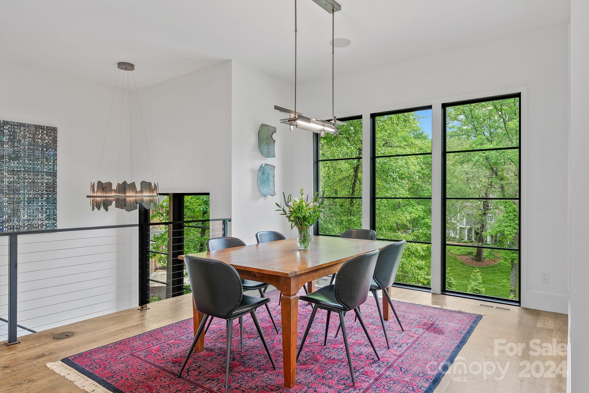 38 Brookwood Road Asheville, NC 28804 - Photo 16 of 45 a view of a dining room with furniture window and wooden floor