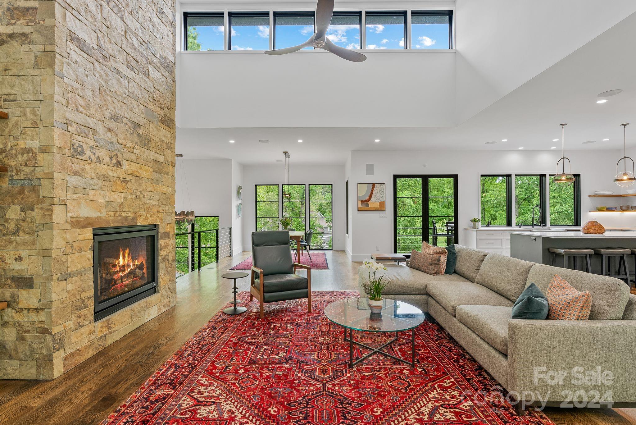 38 Brookwood Road Asheville, NC 28804 - Photo 21 of 45 a living room with furniture and a fireplace