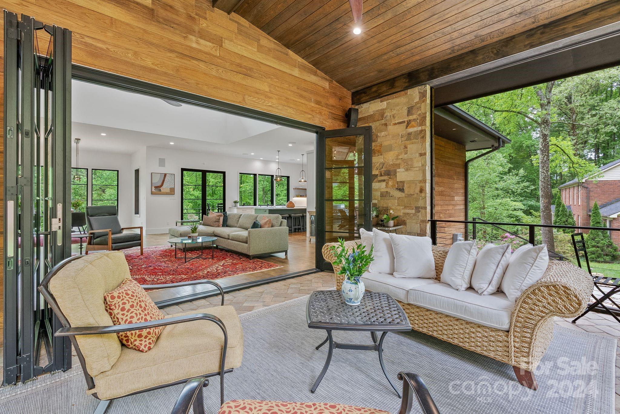 38 Brookwood Road Asheville, NC 28804 - Photo 23 of 45 a outdoor living space with furniture and garden view