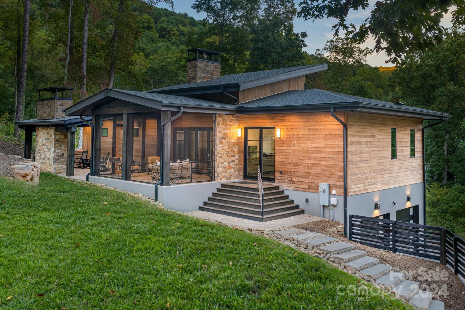 38 Brookwood Road Asheville, NC 28804 - Photo 3 of 45 a view of a house with backyard and garden
