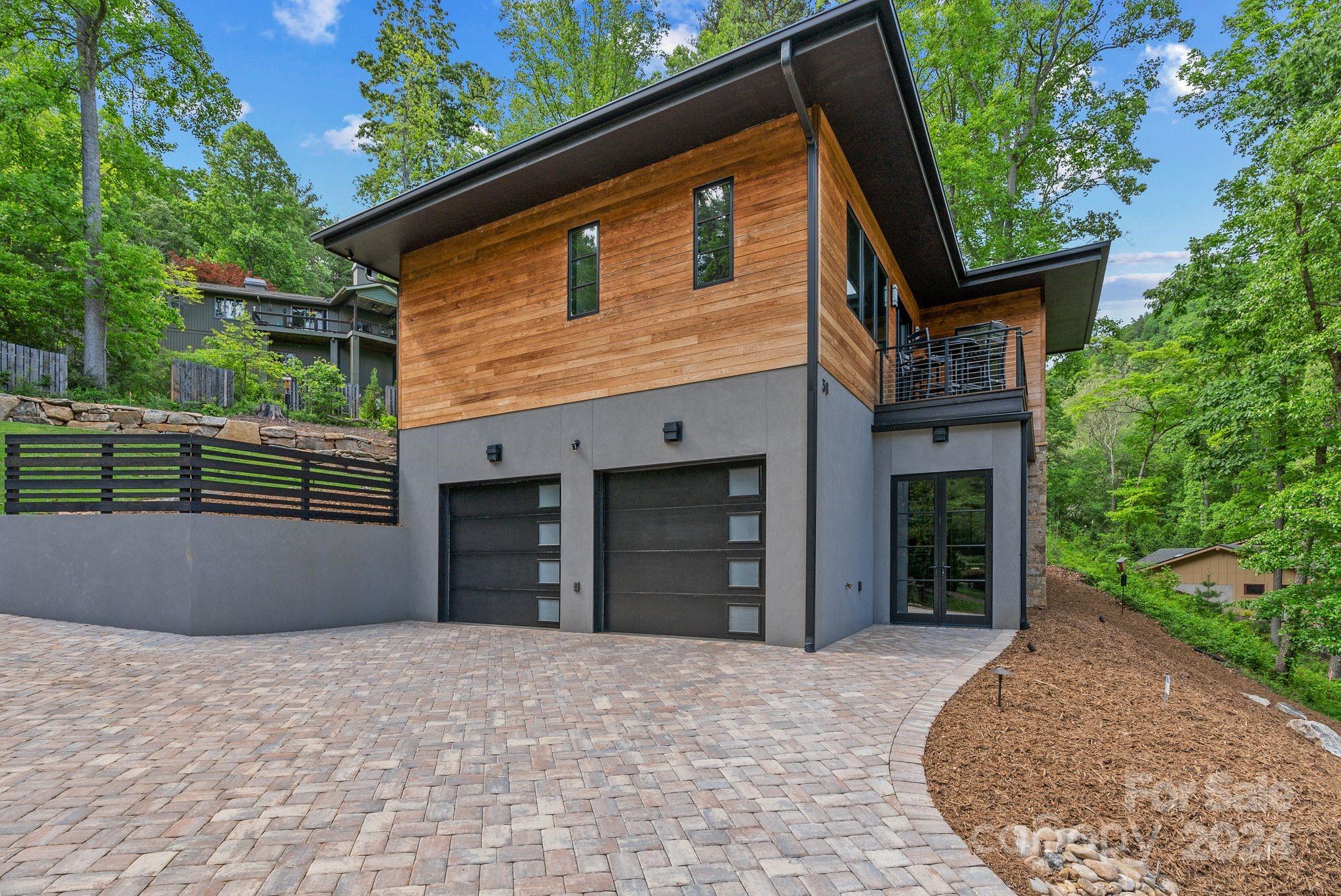 38 Brookwood Road Asheville, NC 28804 - Photo 44 of 45 a front view of a house with a yard