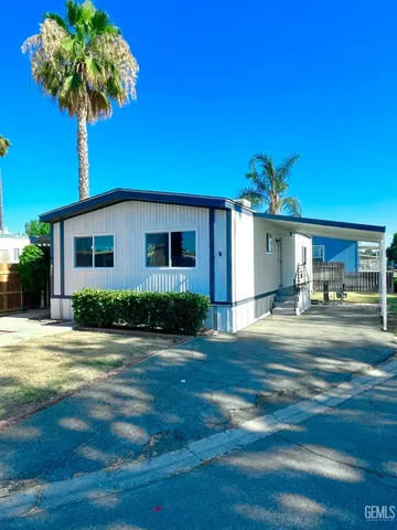 a view of park with stairs and a bench