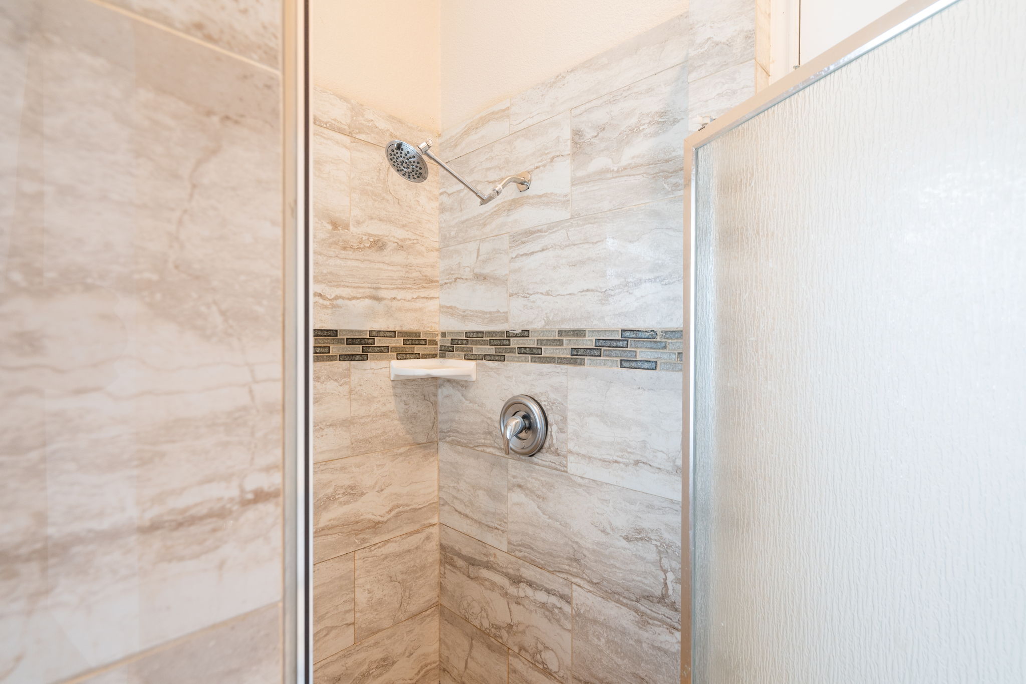 5611 Meadow Crest Austin, TX 78744 - Photo 13 of 26 Full bath featuring a stall shower