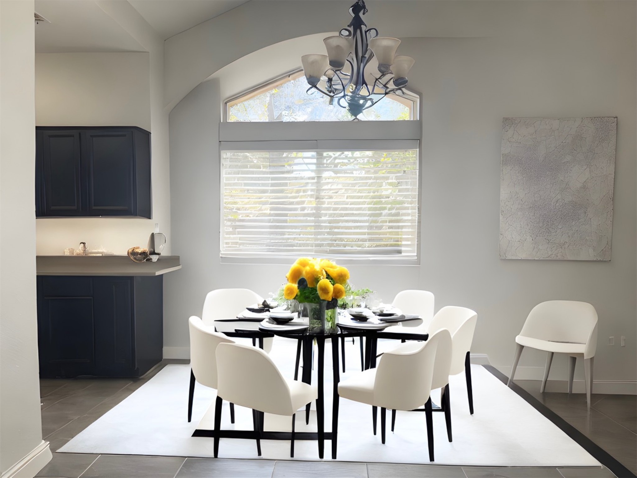 5611 Meadow Crest Austin, TX 78744 - Photo 6 of 26 Dining room with hanging lights and light tile patterned flooring