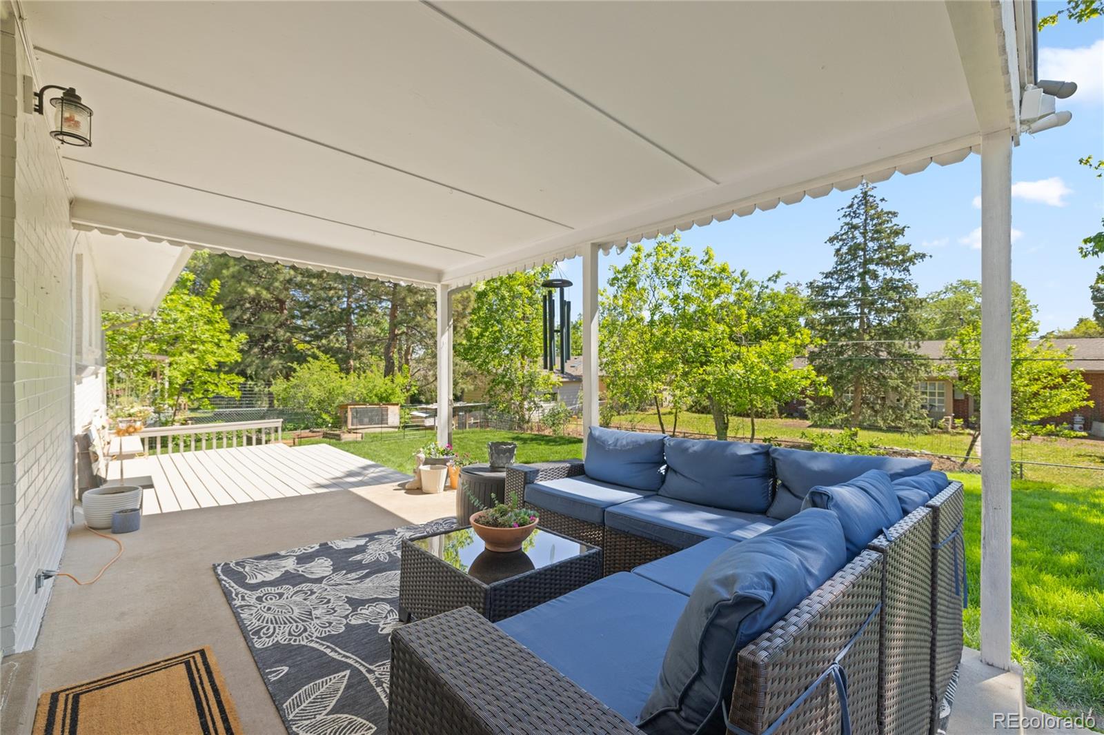 13402 West 24th Place Golden, CO 80401 - Photo 30 of 38 a living room with furniture and a large window