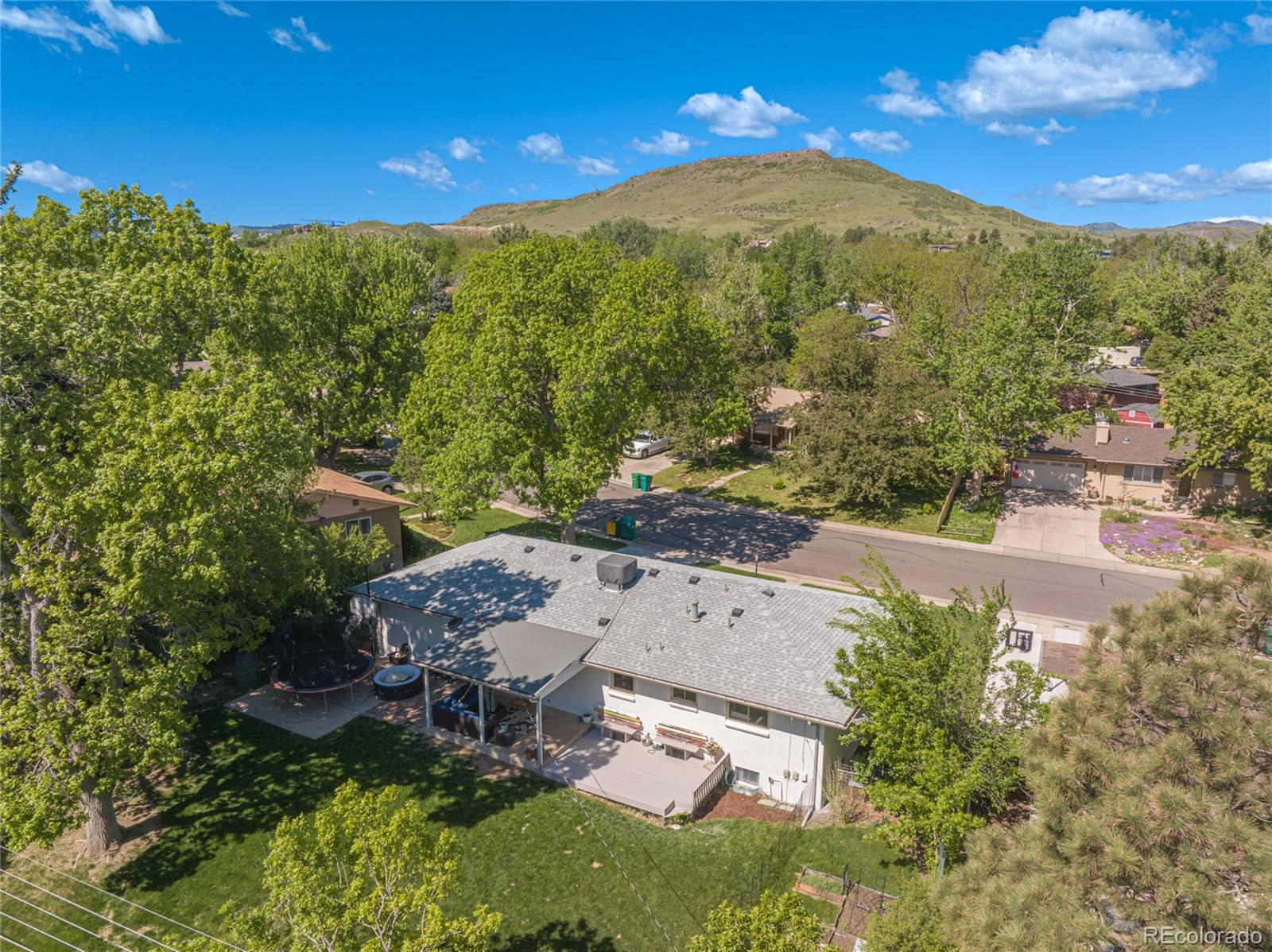 13402 West 24th Place Golden, CO 80401 - Photo 34 of 38 an aerial view of a house with mountain view