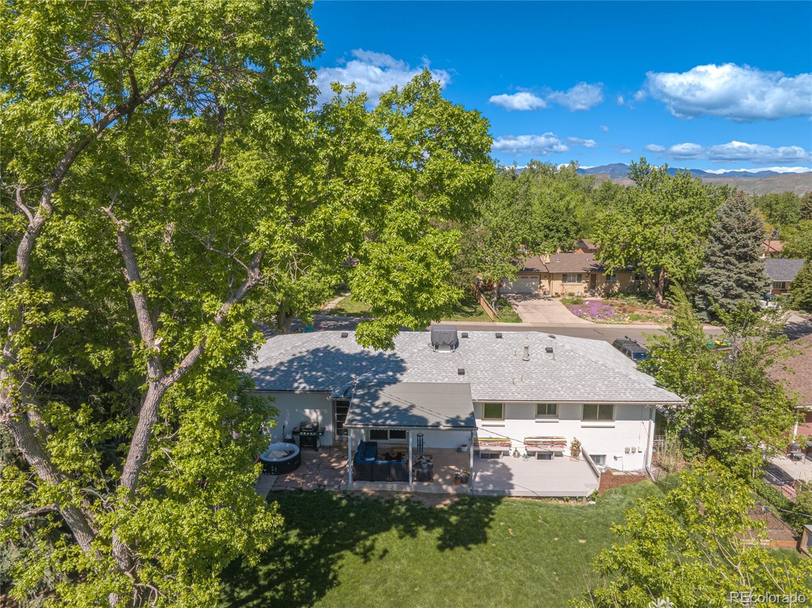 13402 West 24th Place Golden, CO 80401 - Photo 35 of 38 an aerial view of a house with yard swimming pool and outdoor seating