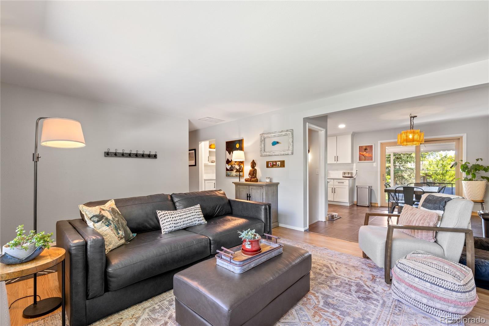 13402 West 24th Place Golden, CO 80401 - Photo 6 of 38 a living room with furniture and a couch