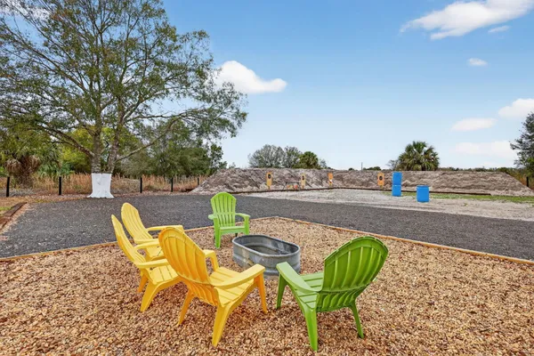 a view of a swimming pool with a lounge chairs