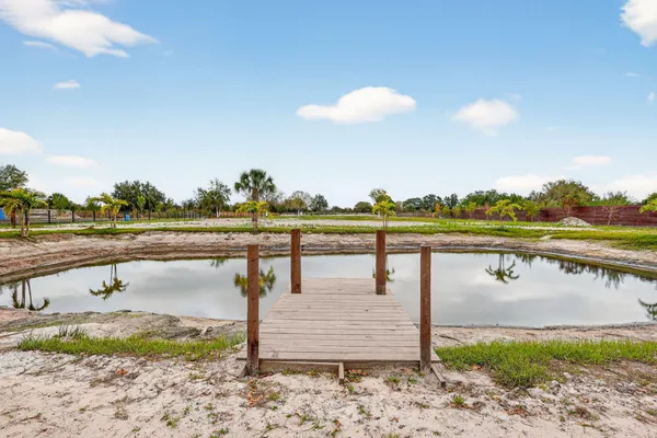 a view of a lake with a outdoor space