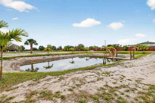 a view of a lake with a beach