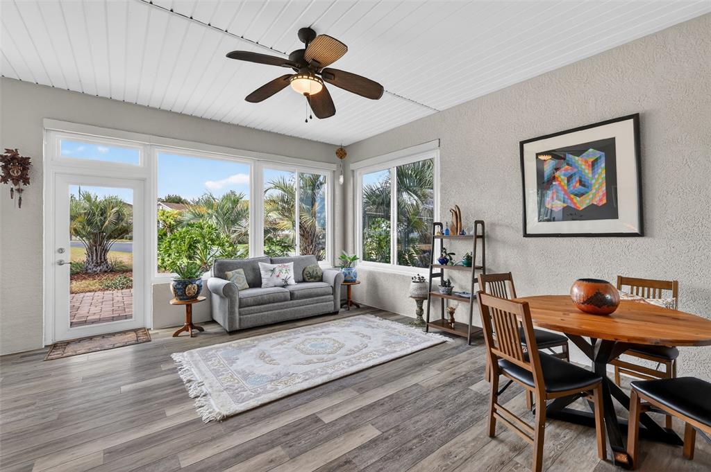 9630 Southwest 86th Place Ocala, FL 34481 - Photo 22 of 42 a living room with furniture and a large window