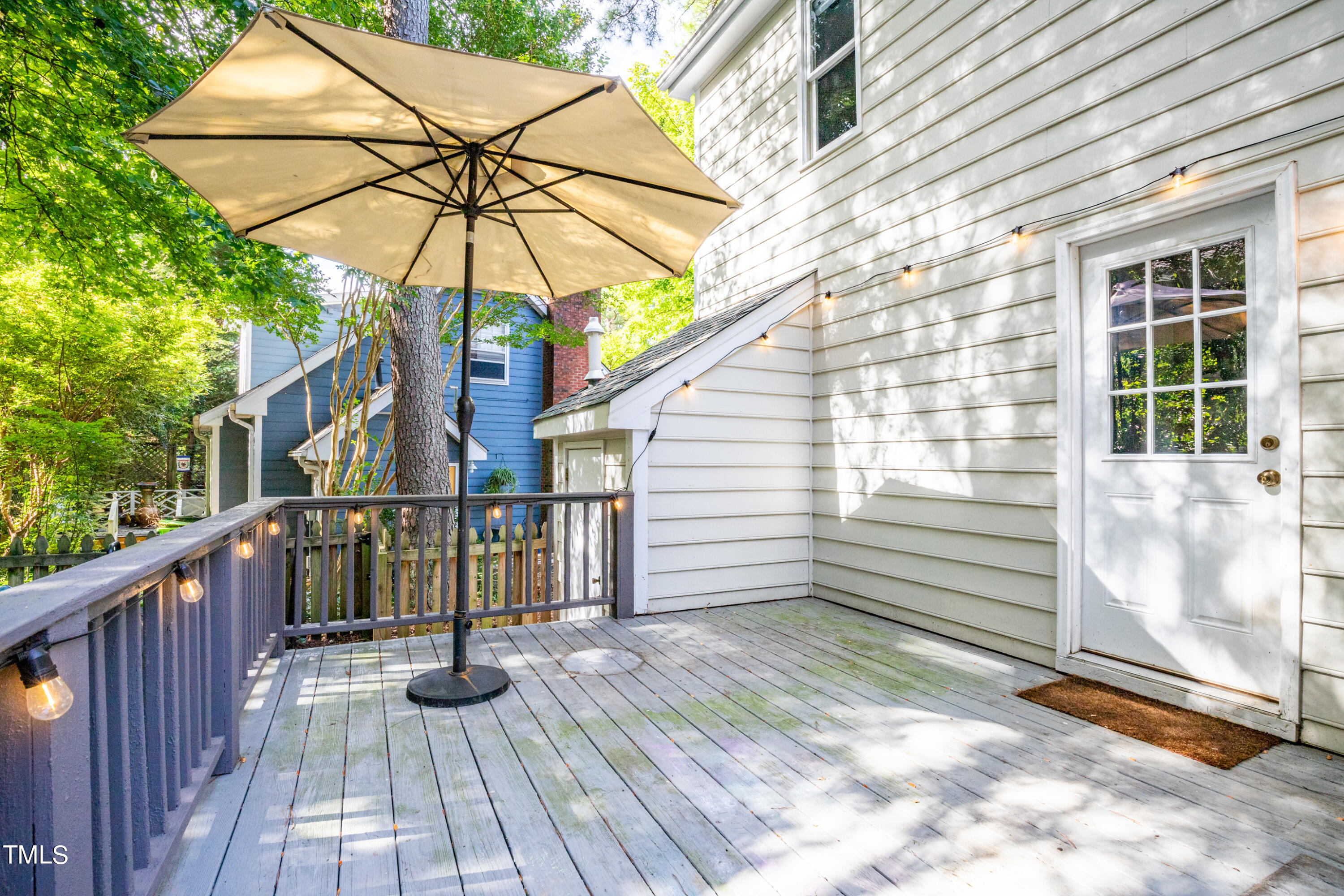 7012 Sandringham Drive Raleigh, NC 27613 - Photo 30 of 46 a view of a chair and tables in the balcony