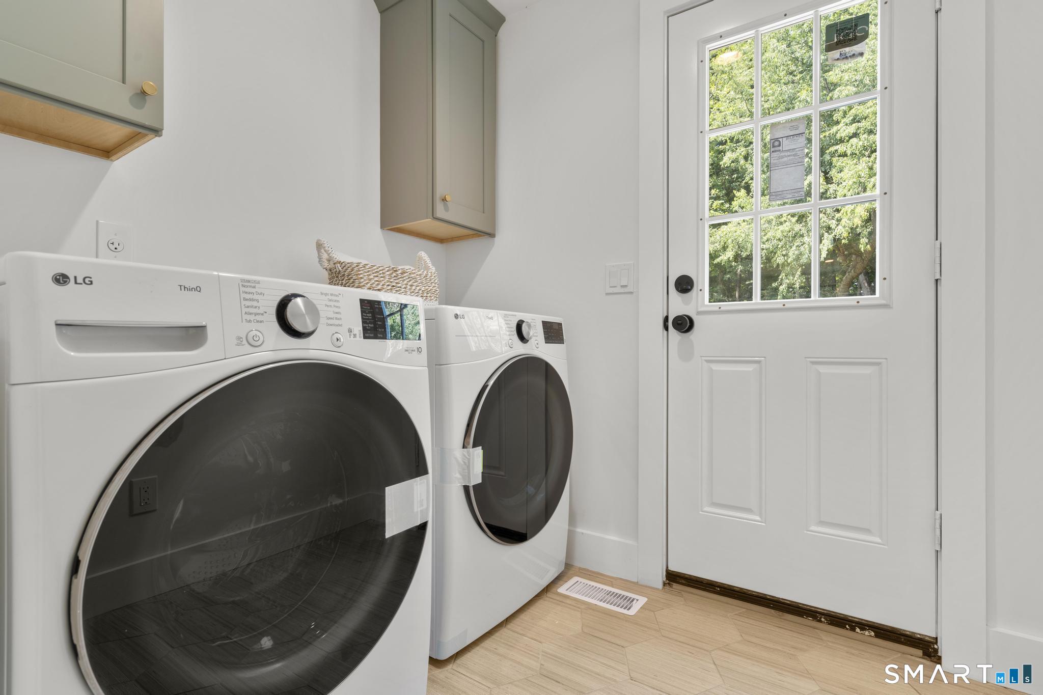 22 Beaver Brook Road Ridgefield, CT 06877 - Photo 29 of 40 a utility room with dryer and washer