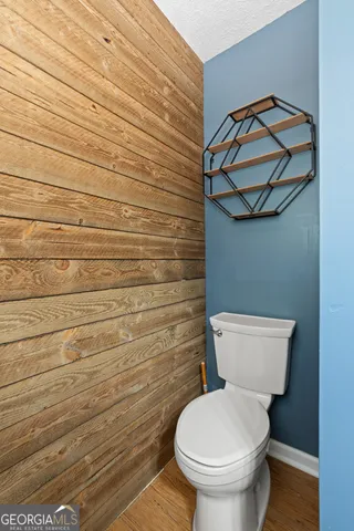 a bathroom with a toilet and a sink