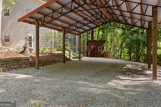 a view of a room with wooden walls