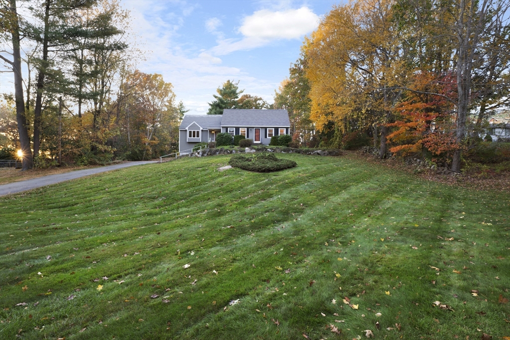 42 Breakneck Road Sturbridge, MA 01566 - Photo 30 of 35 a view of a big house with a big yard and large trees
