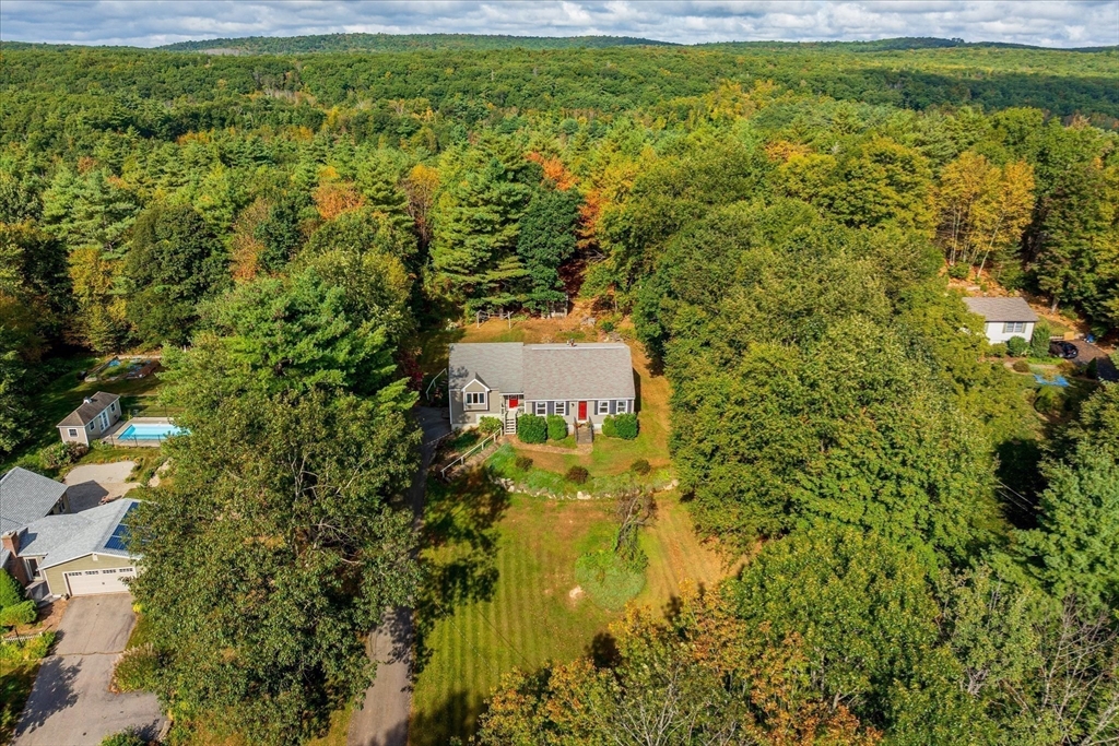 42 Breakneck Road Sturbridge, MA 01566 - Photo 3 of 35 a view of a yard with plants