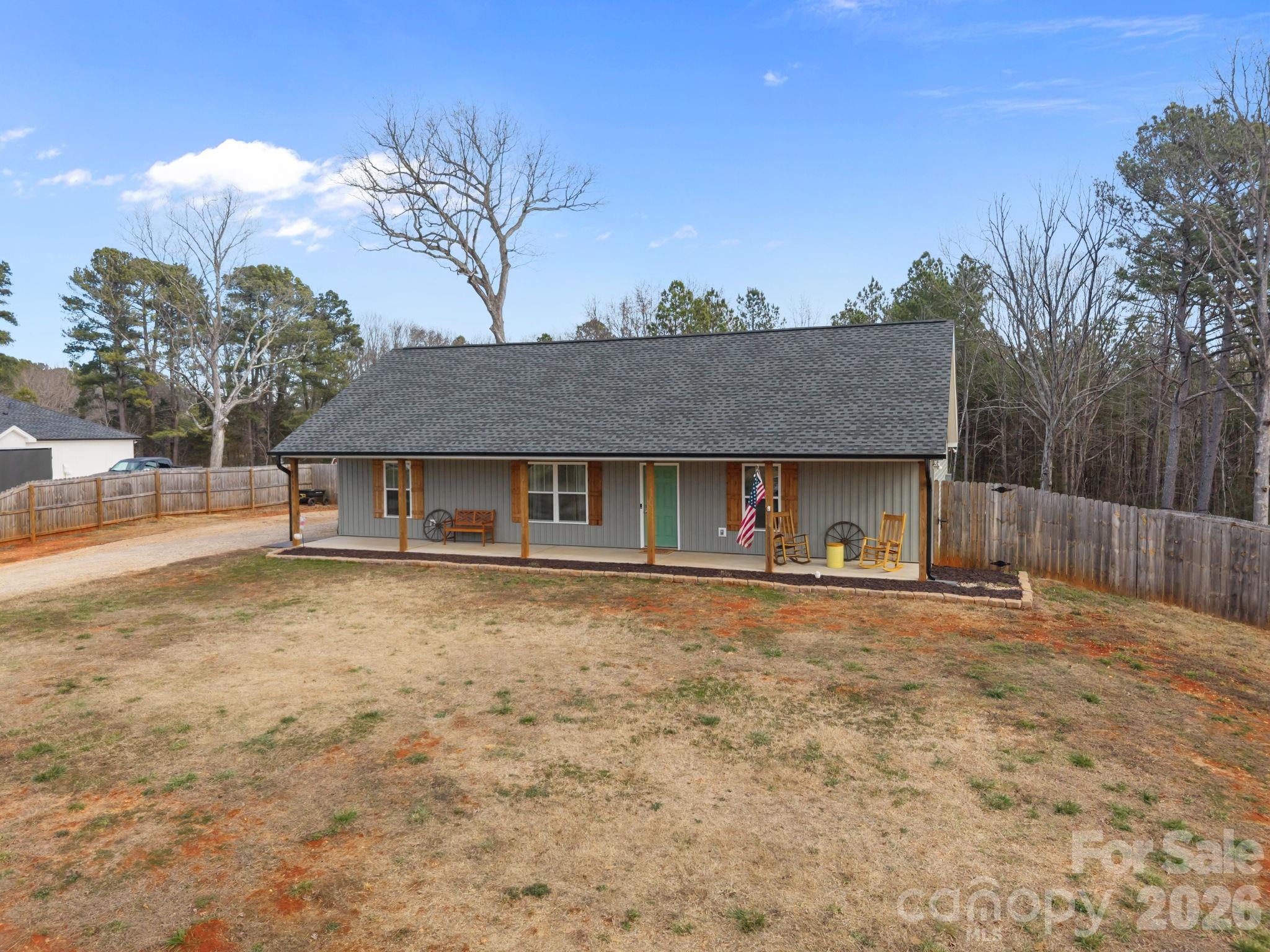 1464 State Rd S-46-996 York, SC 29745 - Photo 1 of 17 a front view of a house with a yard and garage