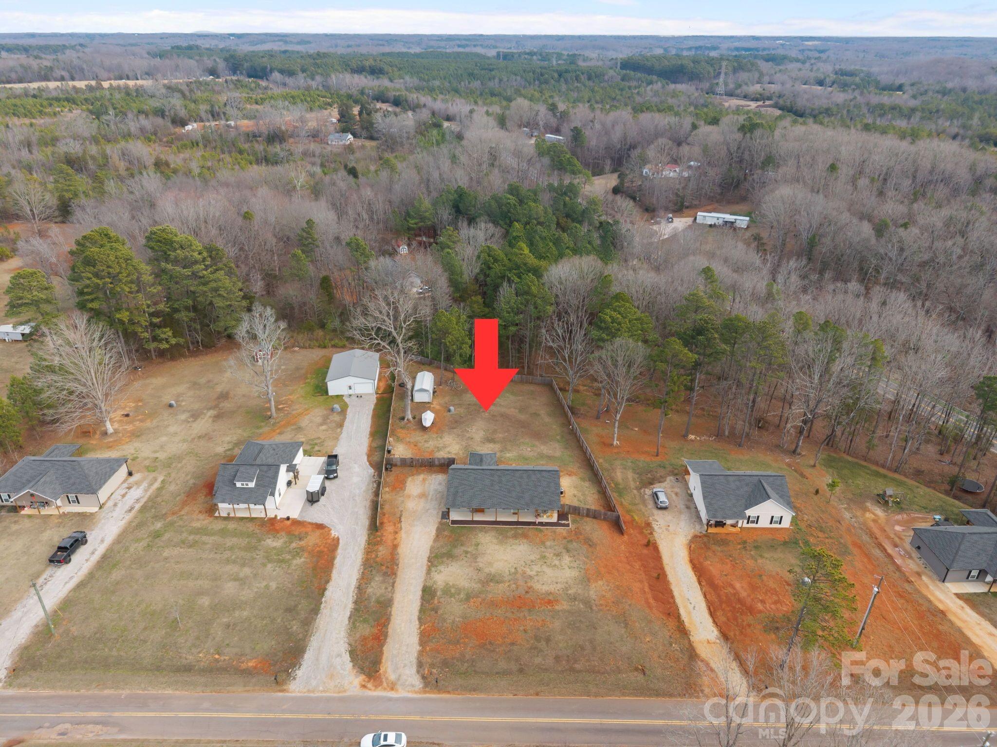 1464 State Rd S-46-996 York, SC 29745 - Photo 16 of 17 an aerial view of residential houses with outdoor space
