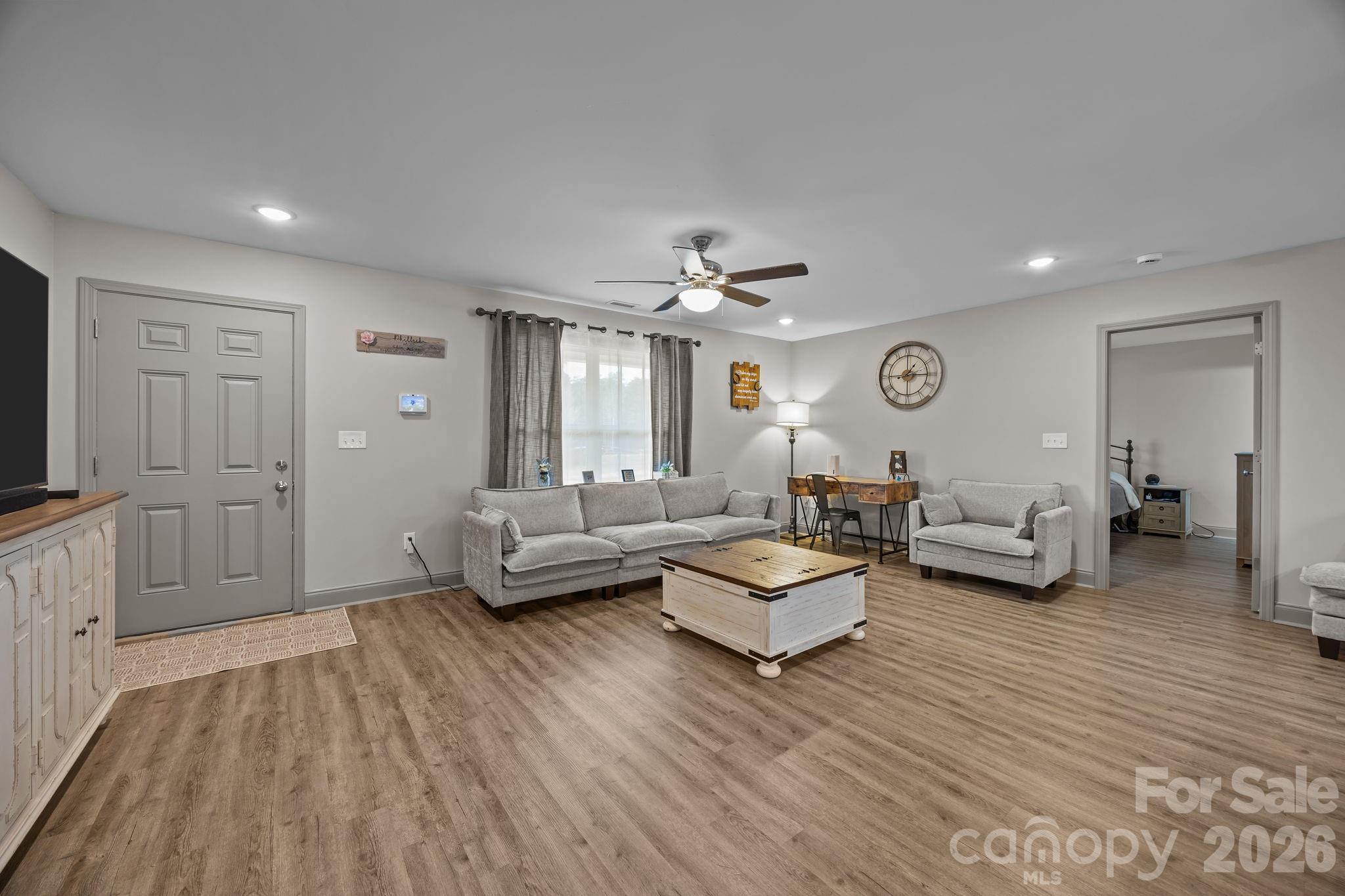1464 State Rd S-46-996 York, SC 29745 - Photo 5 of 17 a living room with furniture and a wooden floor