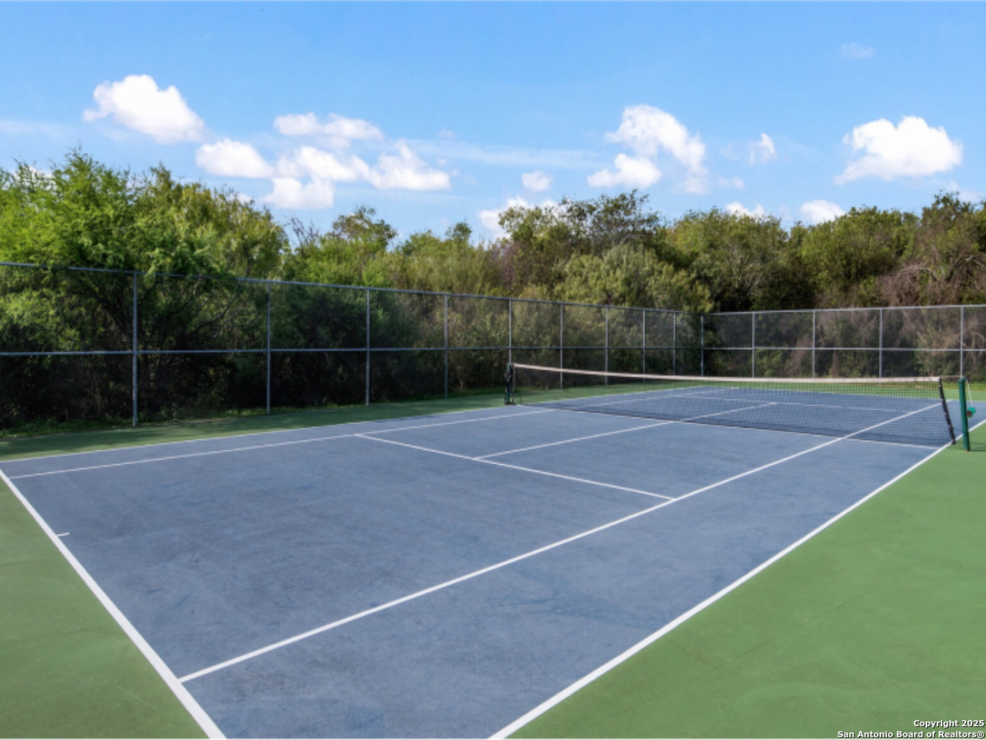 13307 Dutra Road San Antonio, TX 78221 - Photo 29 of 33 a view of a tennis court