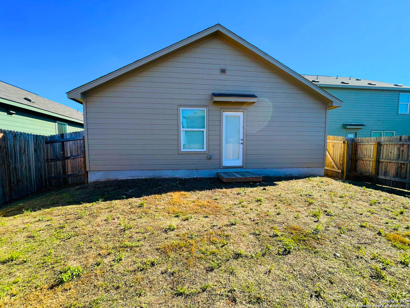 13307 Dutra Road San Antonio, TX 78221 - Photo 31 of 33 a front view of a house with a yard