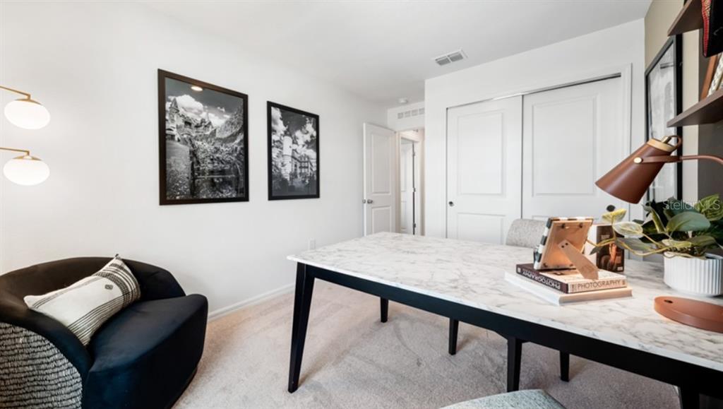 707 Perth Drive, Unit 2 Mount Dora, FL 32757 - Photo 15 of 21 a view of a workspace with furniture