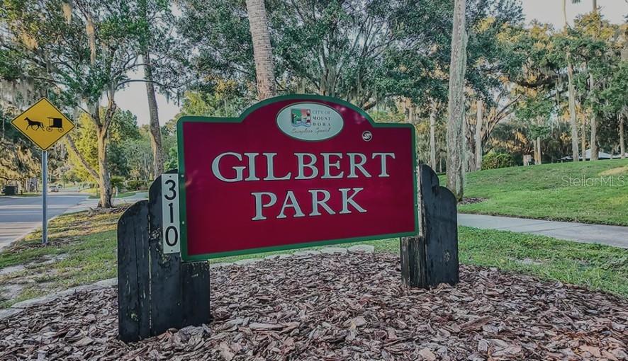 707 Perth Drive, Unit 2 Mount Dora, FL 32757 - Photo 19 of 21 a sign that is sitting on a brick wall