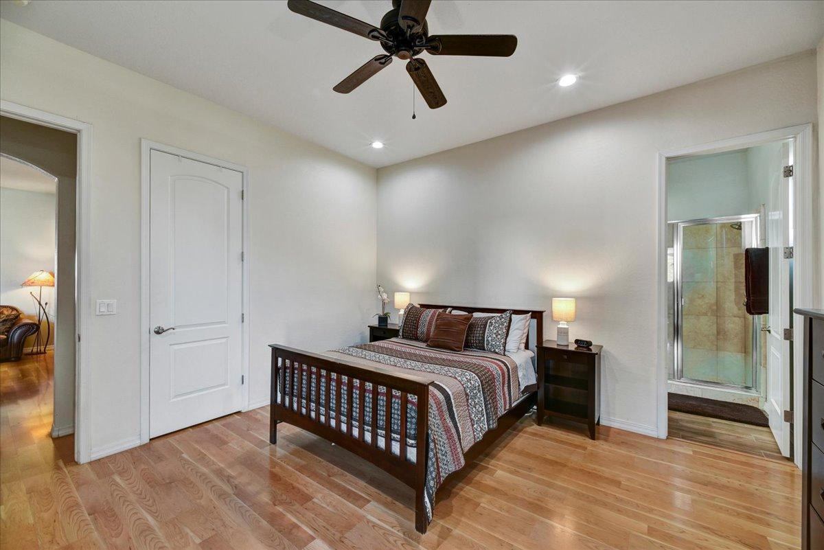 412 East Yearling Road Phoenix, AZ 85085 - Photo 23 of 51 a bedroom with a bed and a walk in closet