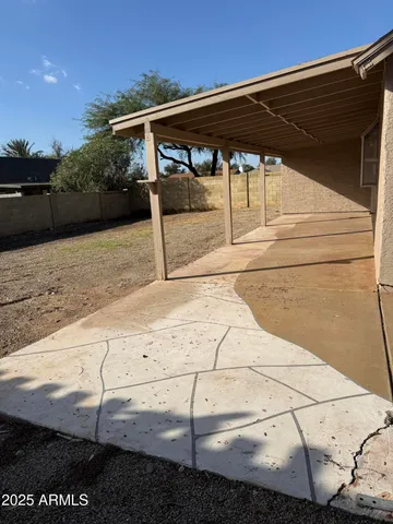 a backyard of a house with lots of green space