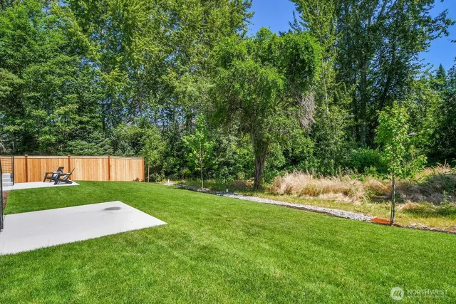 a view of a backyard with a garden