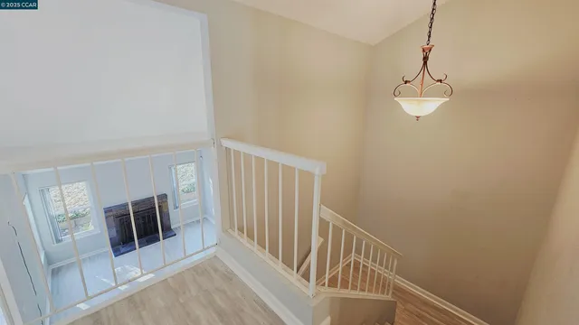 a view of a livingroom with a staircase