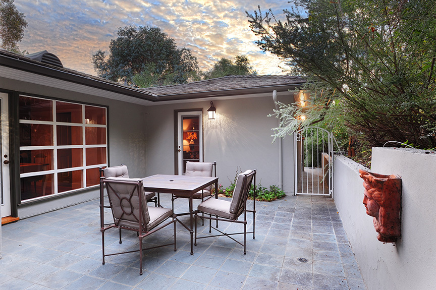 1736 Lasuen Road Santa Barbara, CA 93103 - Photo 16 of 17 a view of backyard of house with outdoor seating