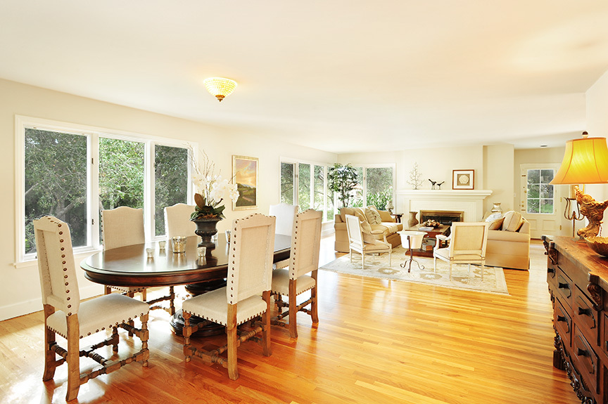 1736 Lasuen Road Santa Barbara, CA 93103 - Photo 4 of 17 a living room with fireplace furniture and a large window