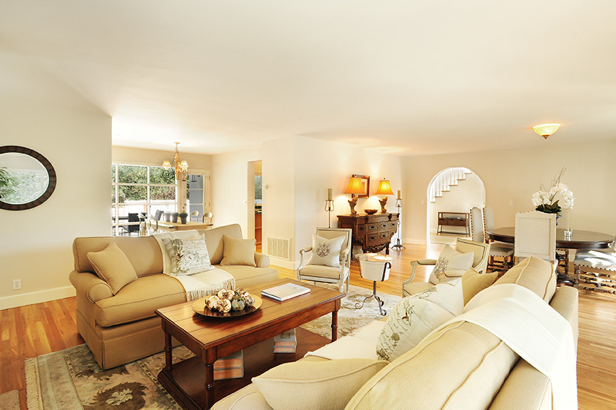 1736 Lasuen Road Santa Barbara, CA 93103 - Photo 5 of 17 a living room with furniture a rug and a window