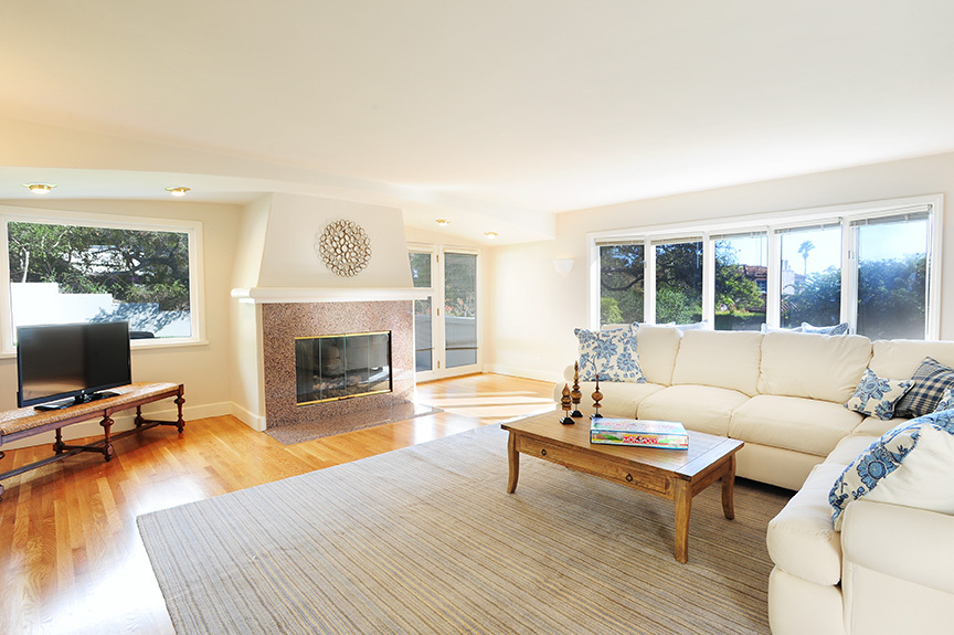 1736 Lasuen Road Santa Barbara, CA 93103 - Photo 7 of 17 a living room with furniture fireplace and window