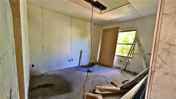 a room with furniture and window