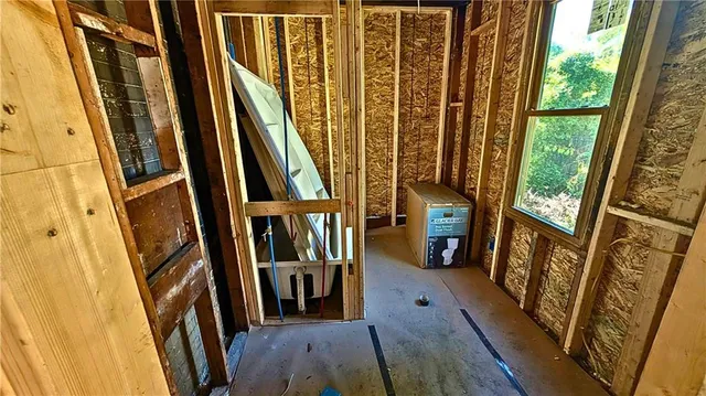 a view of an entryway with a door