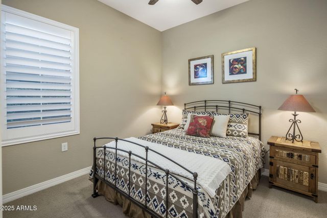 a bathroom with a sink toilet and a mirror