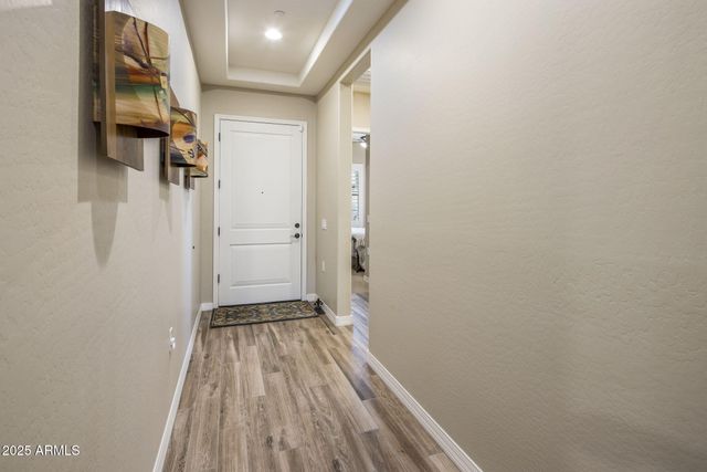 a view of hallway with washer and dryer