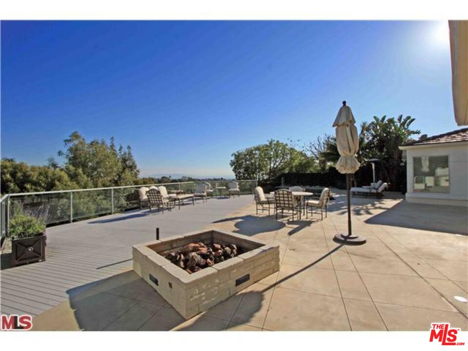 1148 Las Pulgas Road Pacific Palisades, CA 90272 - Photo 13 of 13 a building view with sitting space and garden