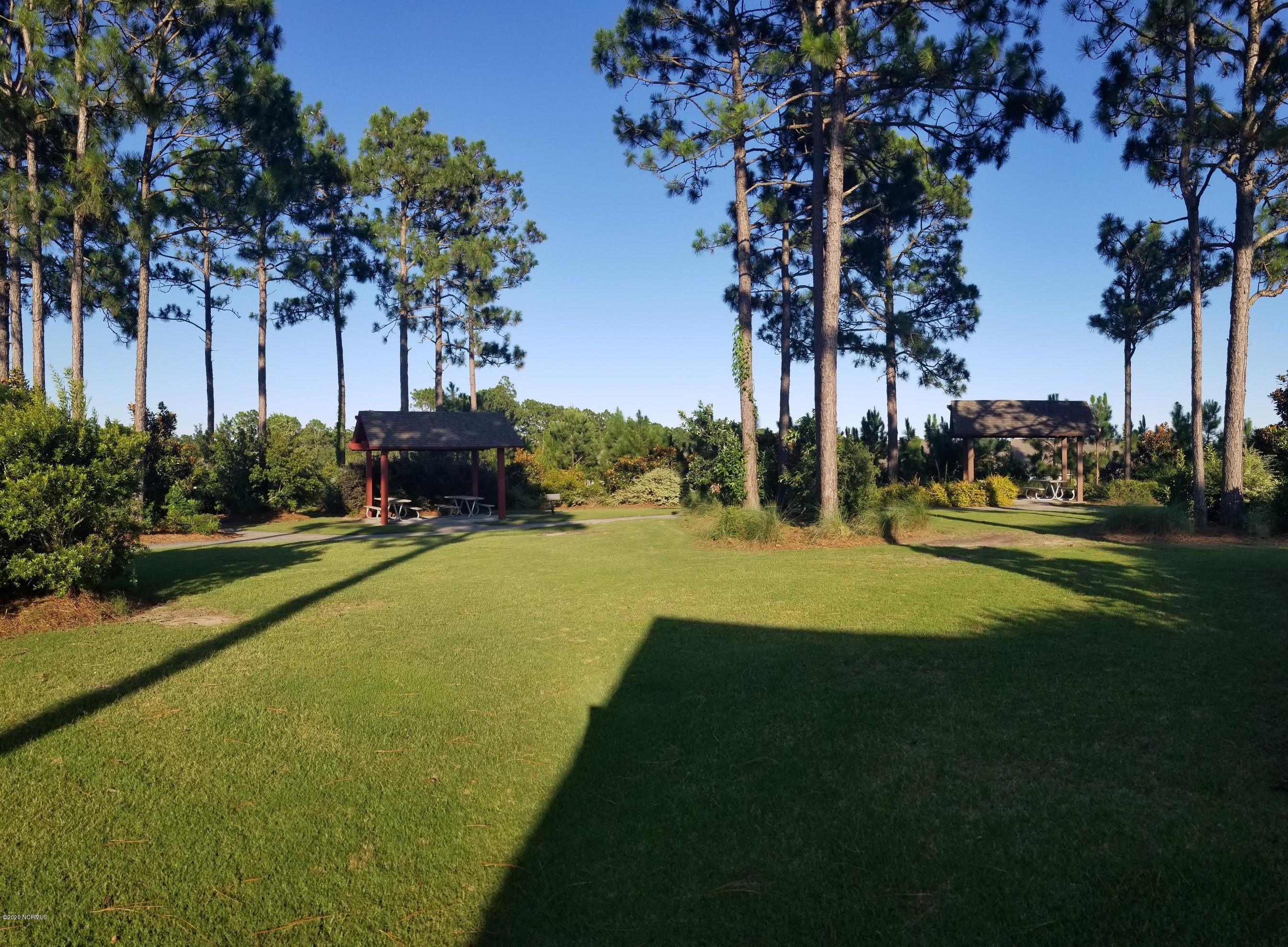 412 Tree Court Holly Ridge, NC 28445 - Photo 28 of 31 Common Area Behind the home