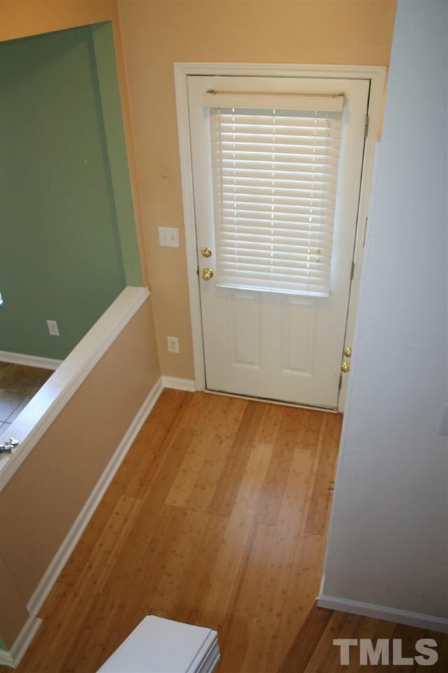 5025 Echo Ridge Road Raleigh, NC 27612 - Photo 5 of 18 a bathroom with a sink and a toilet