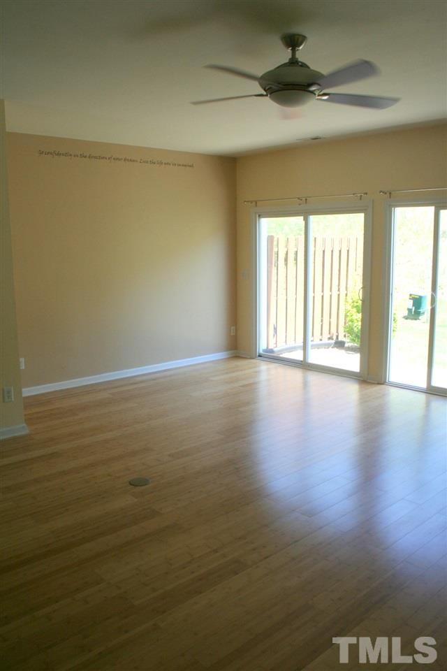 5025 Echo Ridge Road Raleigh, NC 27612 - Photo 9 of 18 a view of an empty room with a window